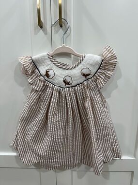 Brown and white smocked seersucker dress
